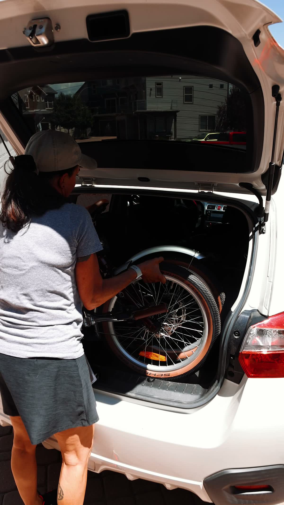 HeyBike Ranger folding eBike loaded into an SUV